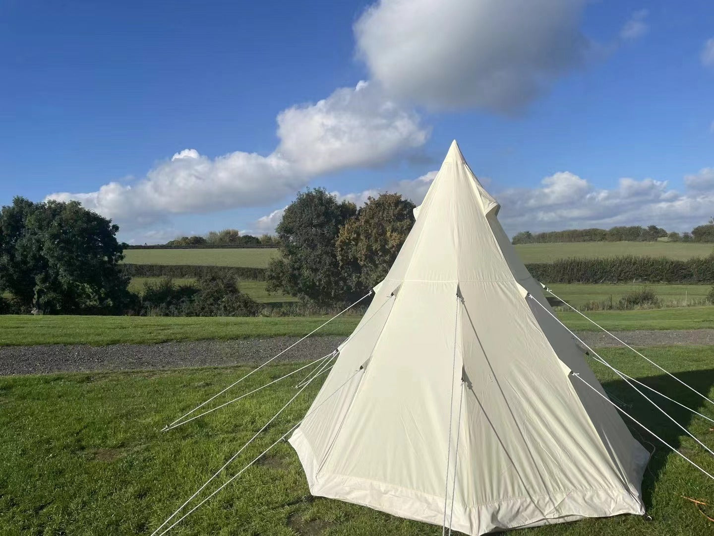 4-Season 9.85ft Canvas Bell Tent for Camping & Glamping - outdoor setup in campsite from Campingood