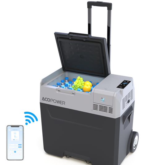 52Qt Portable Car Freezer with off-road wheels at a campsite
